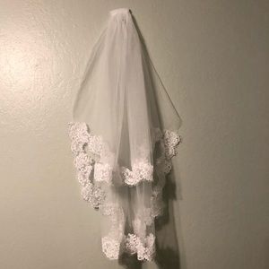 White 2 tier fingertip length lace wedding veil
